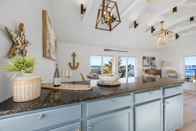 a kitchen with a sink and a stove