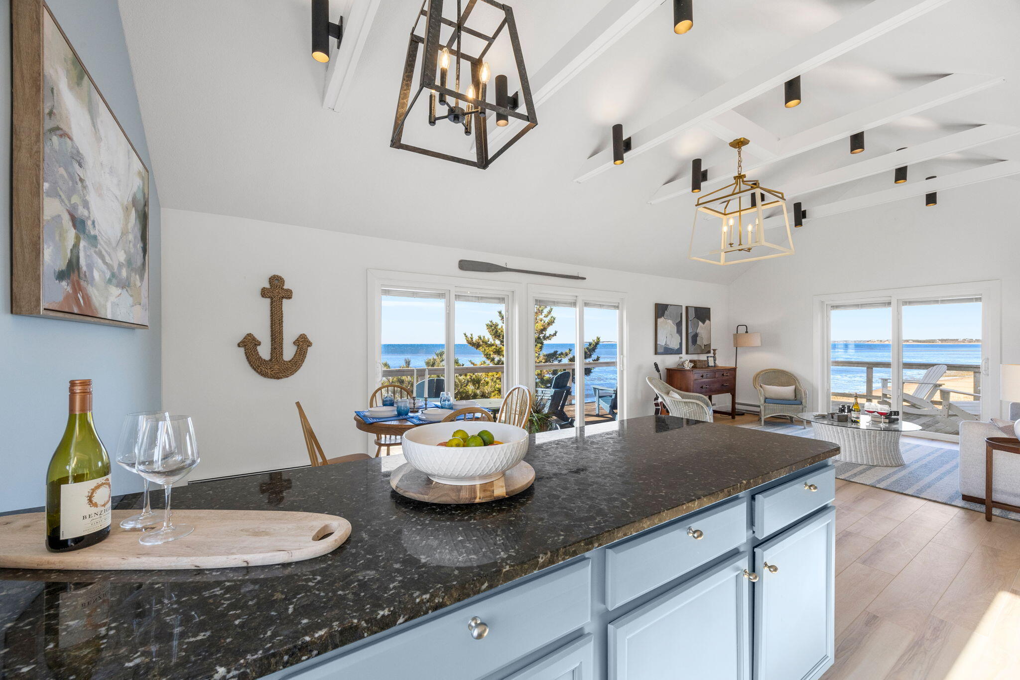 340 Salt Works Road Eastham, MA 02642 - Photo 28 of 52 a kitchen with sink and view of living room