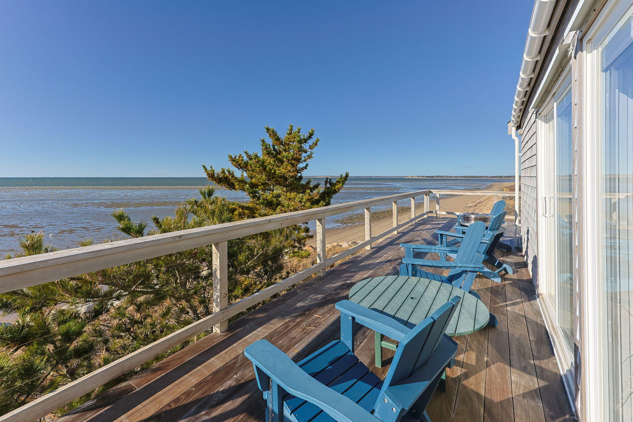 340 Salt Works Road Eastham, MA 02642 - Photo 4 of 52 a view of a balcony with an outdoor space