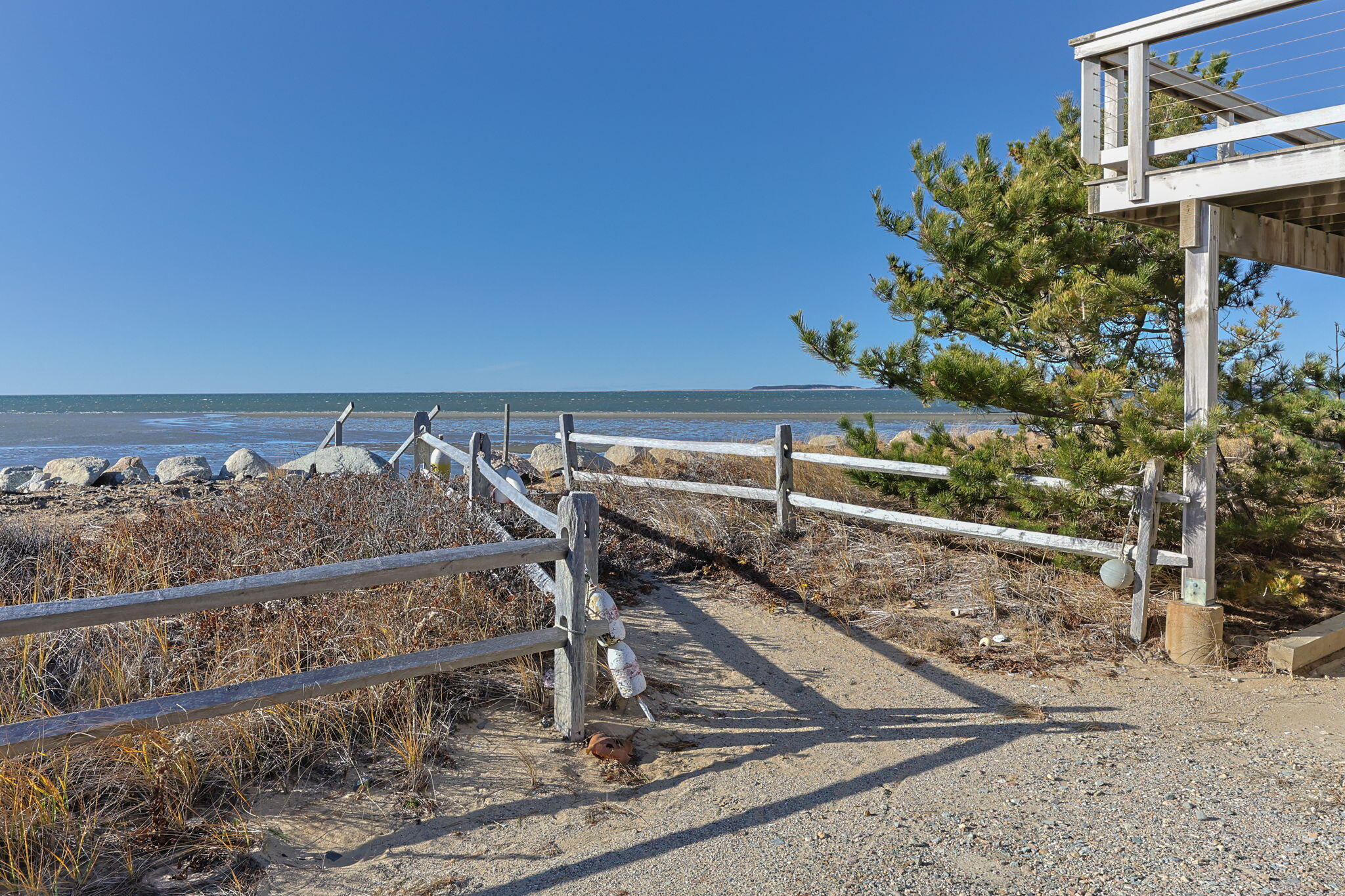 340 Salt Works Road Eastham, MA 02642 - Photo 5 of 52 a view of a ocean from a balcony