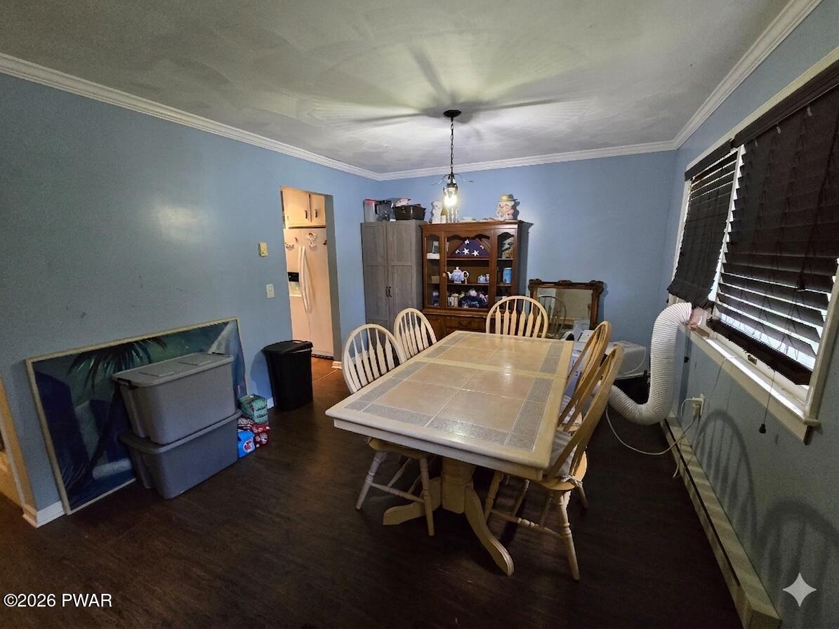 107 Keystone Hls Road, Unit 404 Factoryville, PA 18419 - Photo 23 of 23 a view of a dining room with furniture window and wooden floor