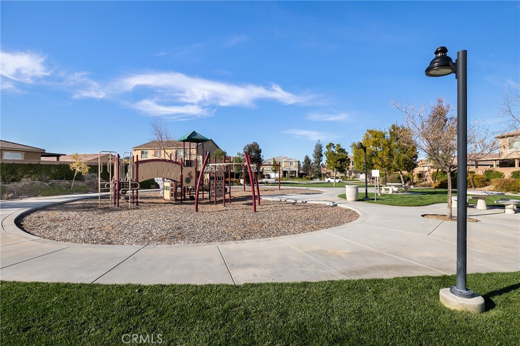 29594 Chelton Way Menifee, CA 92584 - Photo 39 of 48 a view of a yard with cars