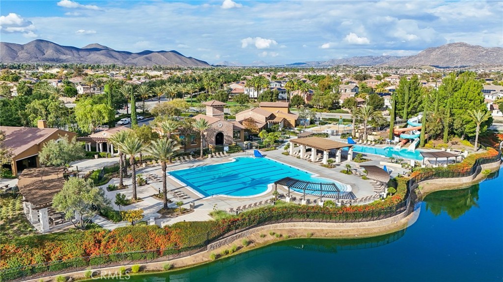 29594 Chelton Way Menifee, CA 92584 - Photo 44 of 48 a view of a swimming pool with a mountain