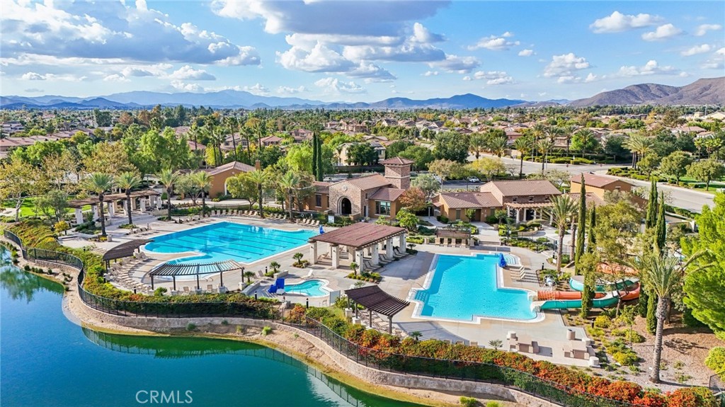 29594 Chelton Way Menifee, CA 92584 - Photo 45 of 48 a view of a city with lots of residential buildings ocean and mountain view in back