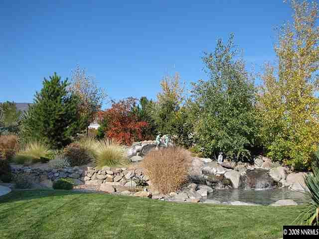 12905 Silver Wolf Road Reno, NV 89511 - Photo 8 of 9 a view of a backyard