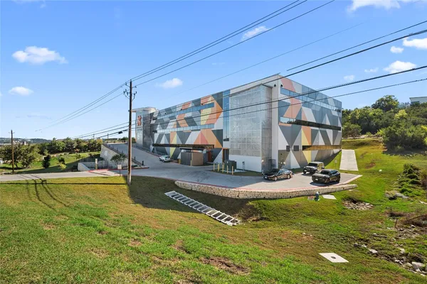 a view of a swimming pool with a yard