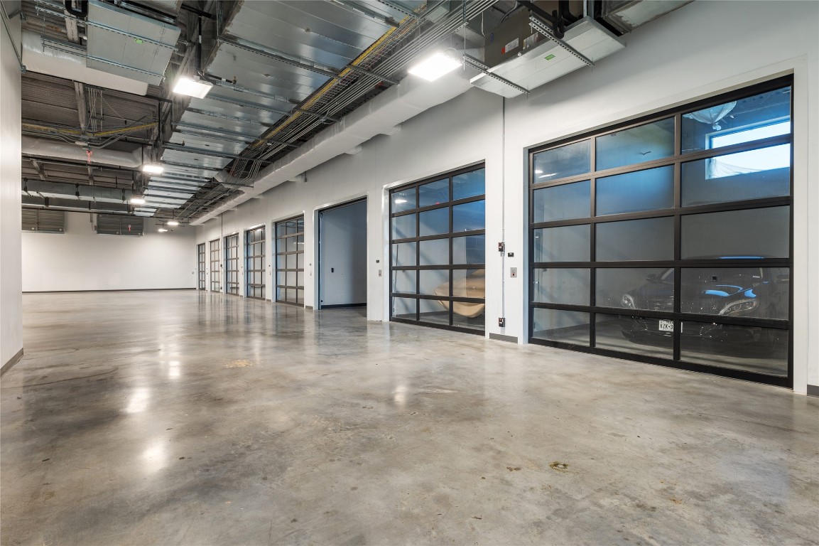 4229 North FM 620, Unit 306 Austin, TX 78734 - Photo 6 of 29 a view of an empty room with wooden shelves
