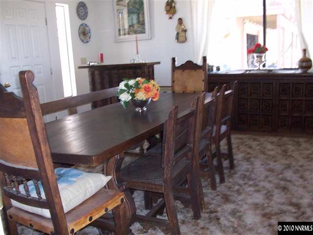 2500 Whiskey Springs Road Reno, NV 89510 - Photo 4 of 9 a view of a dining room with furniture and chandelier