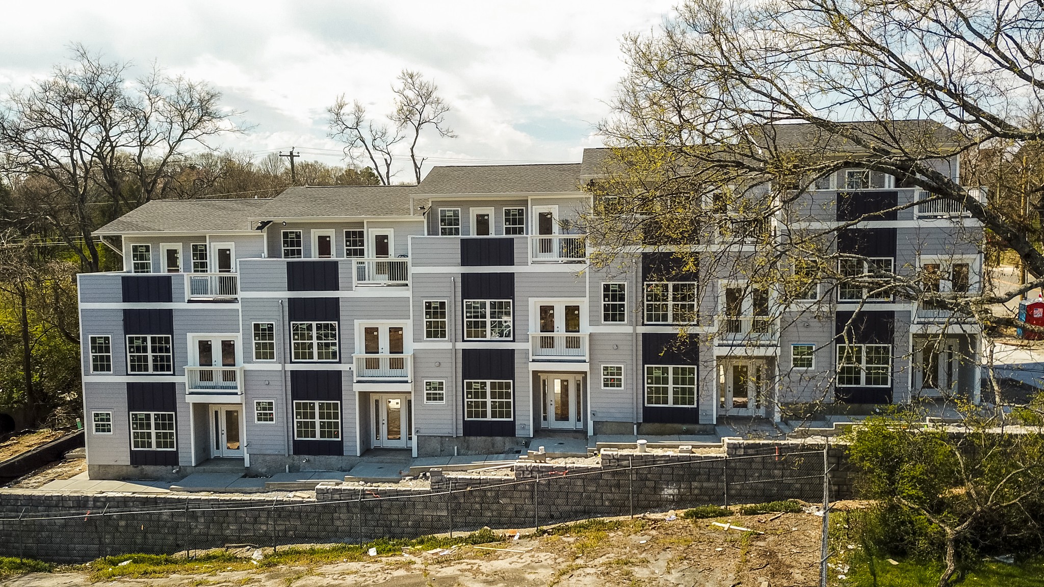421 Elysian Fields Road, Unit 3 Nashville, TN 37211 - Photo 3 of 24 a front view of a building with street view