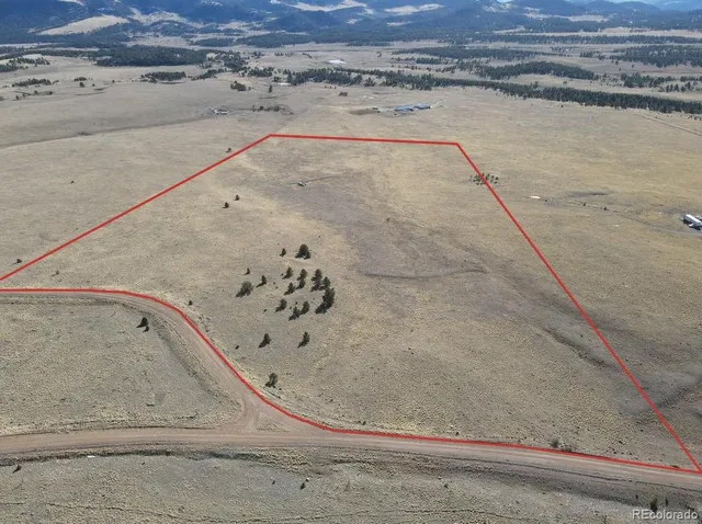 a view of a bath tub and a mountain in the background