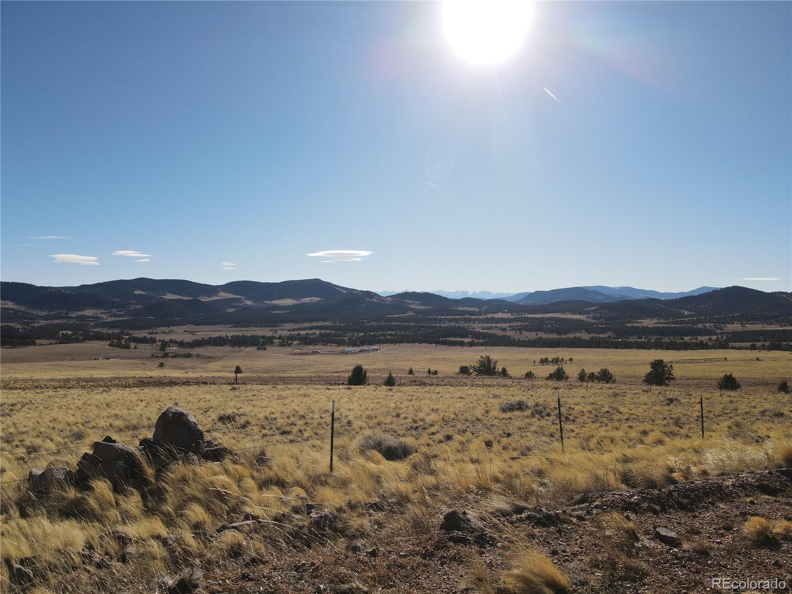 341 Lakeview Trail Guffey, CO 80820 - Photo 2 of 17 a view of lake with mountain