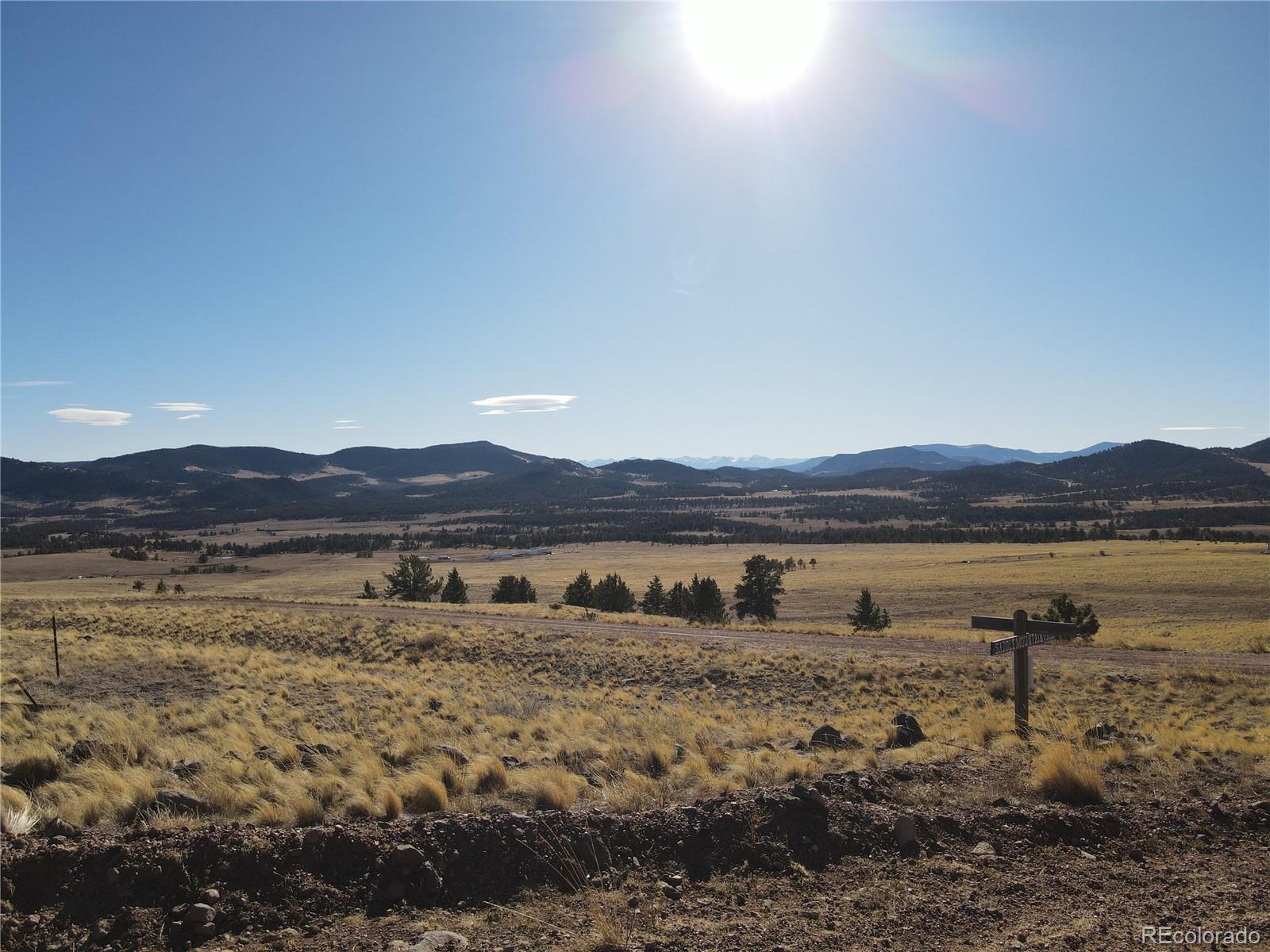 341 Lakeview Trail Guffey, CO 80820 - Photo 3 of 17 a view of lake with mountain