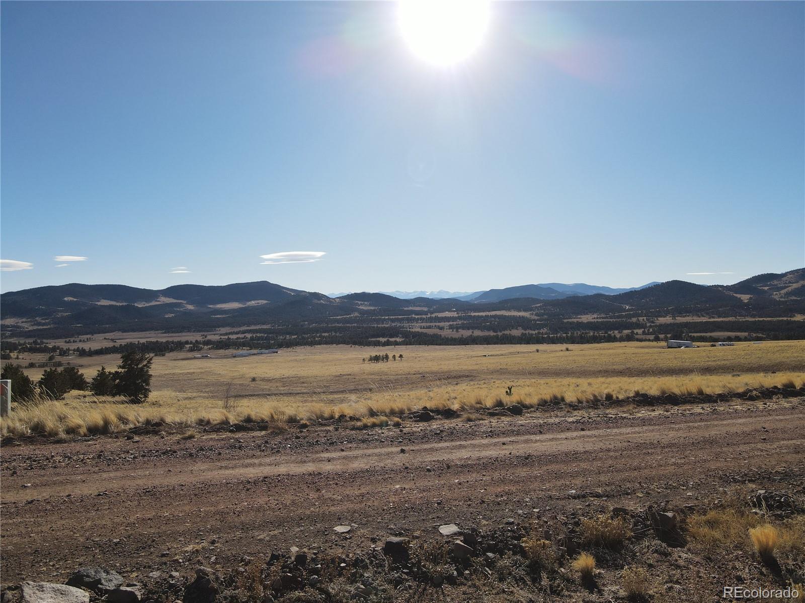 341 Lakeview Trail Guffey, CO 80820 - Photo 6 of 17 a view of a lake and mountain