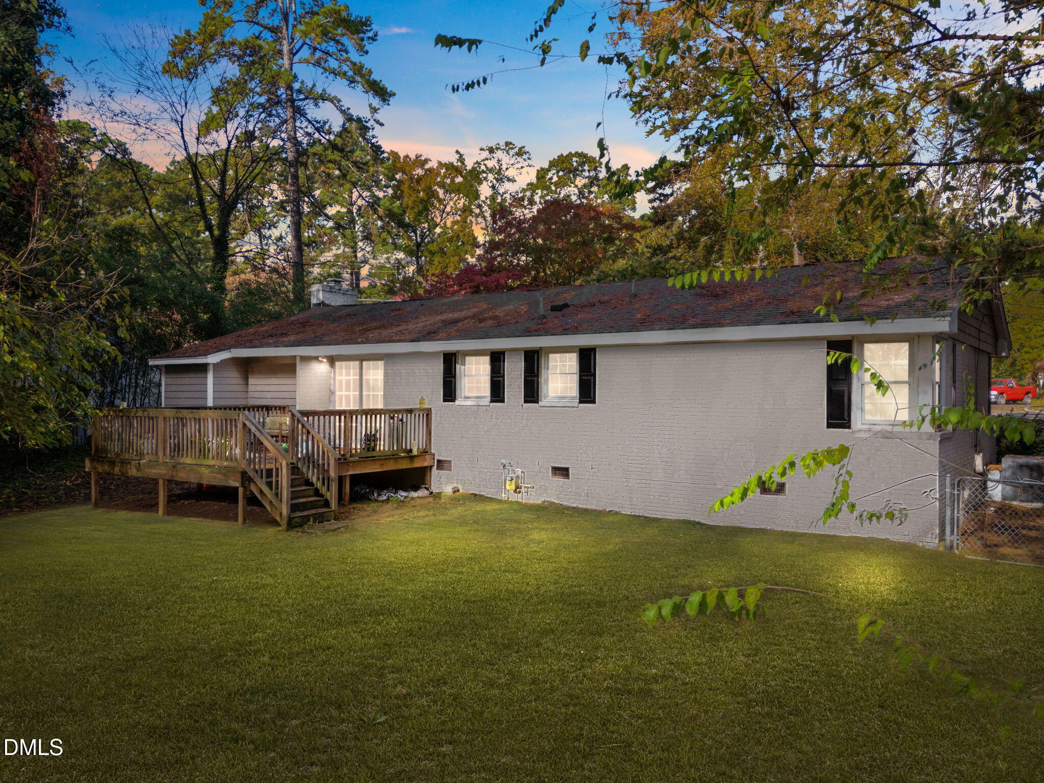 2950 Glenridge Drive Raleigh, NC 27604 - Photo 52 of 53 a view of a house with backyard porch and sitting area
