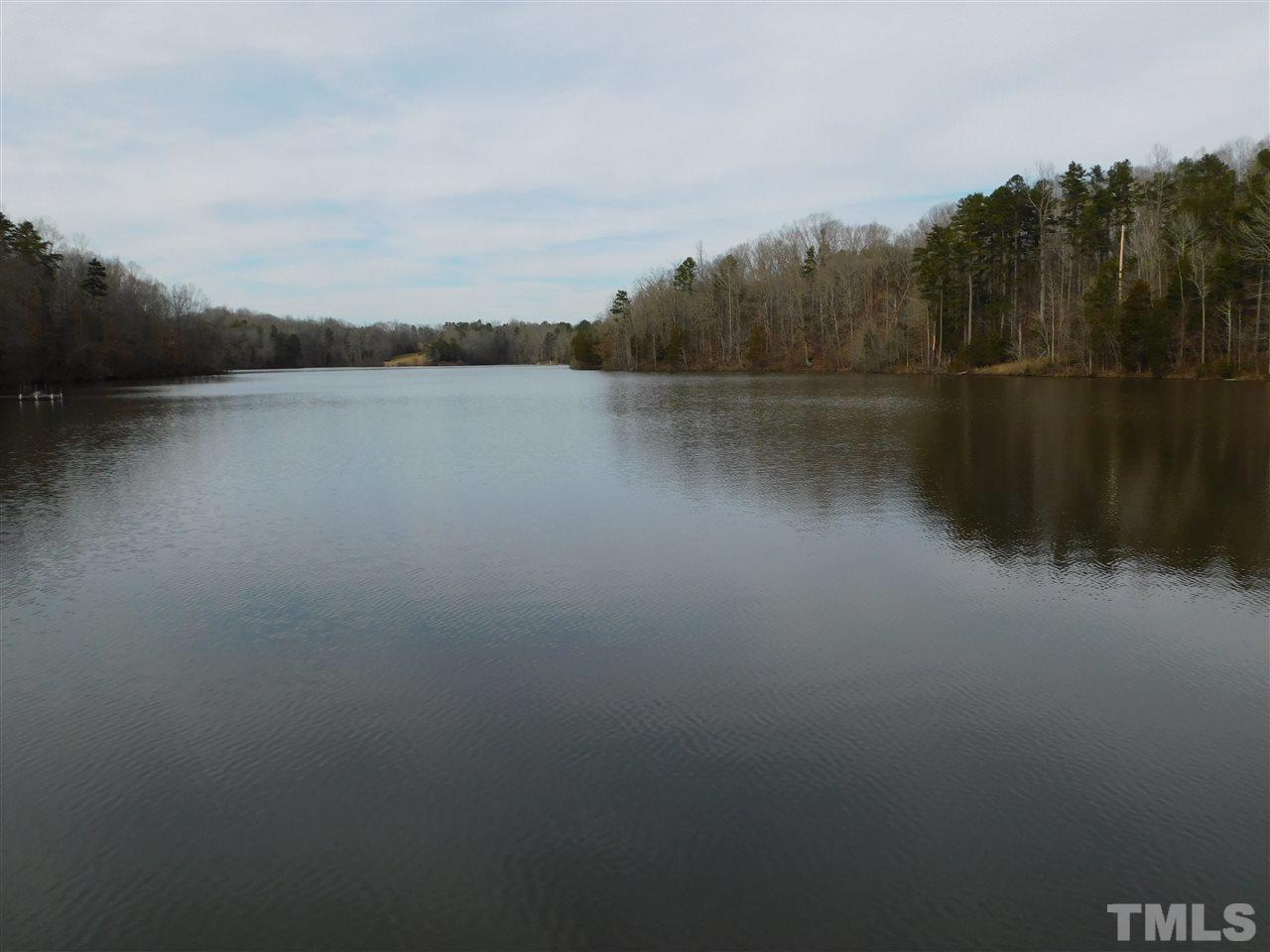 1575 Wilson Road Prospect Hill, NC 27314 - Photo 1 of 9 a view of lake with green space