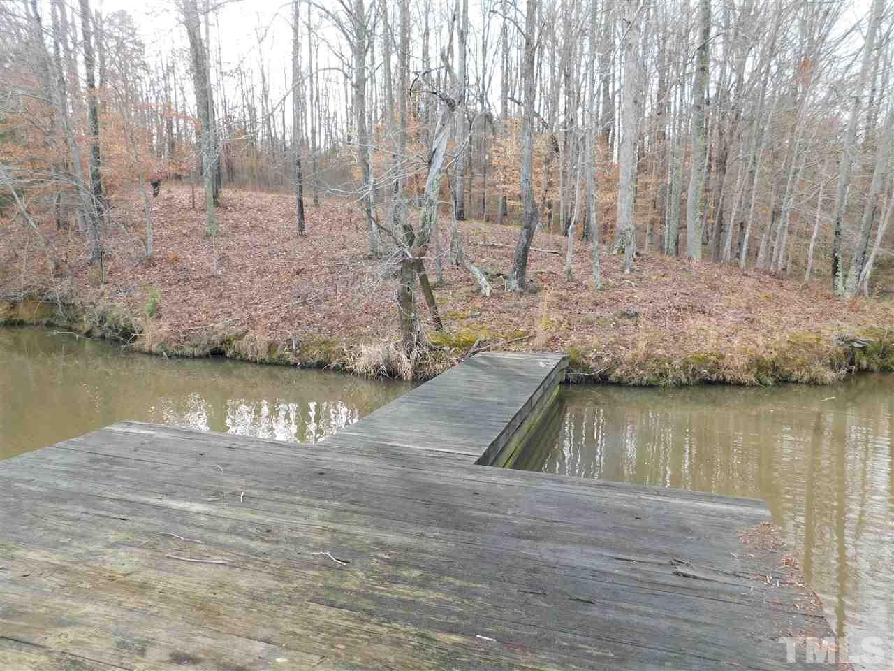 1575 Wilson Road Prospect Hill, NC 27314 - Photo 4 of 9 a view of wooden floor and a lake view