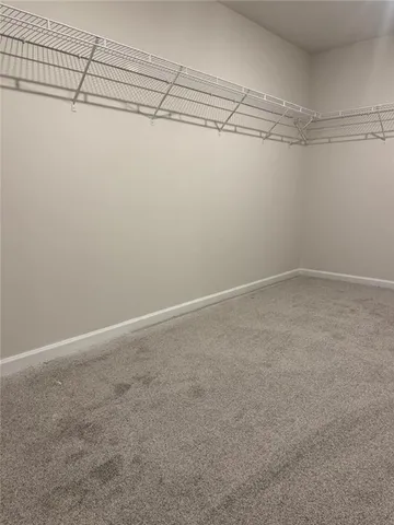 a view of a room with racks on the wall