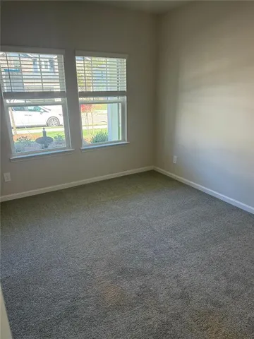 a view of swimming pool from a yard