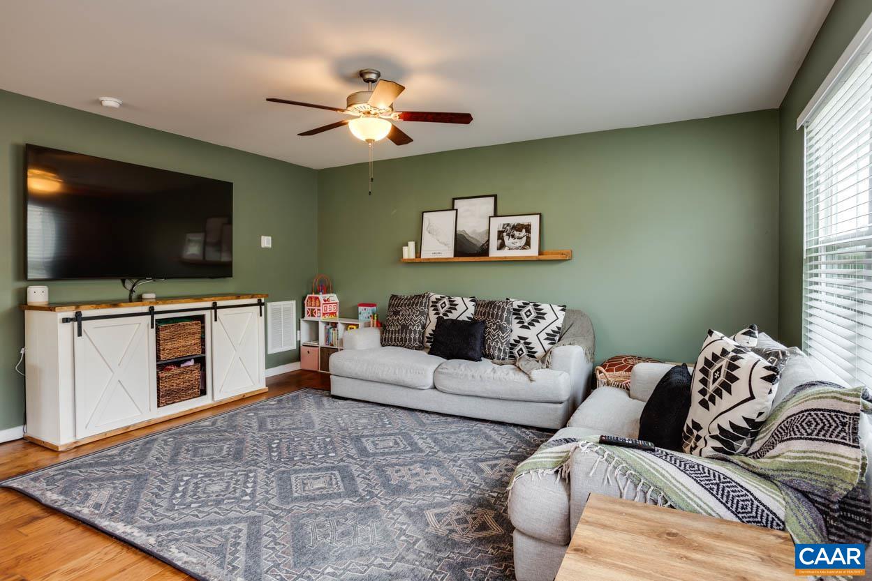 1090 Briery Farm Road Scottsville, VA 24590 - Photo 11 of 30 a living room with furniture and a flat screen tv