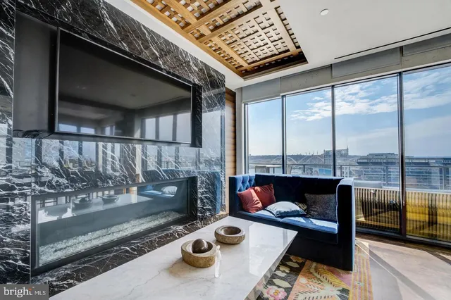 a view of a chairs and table on the deck