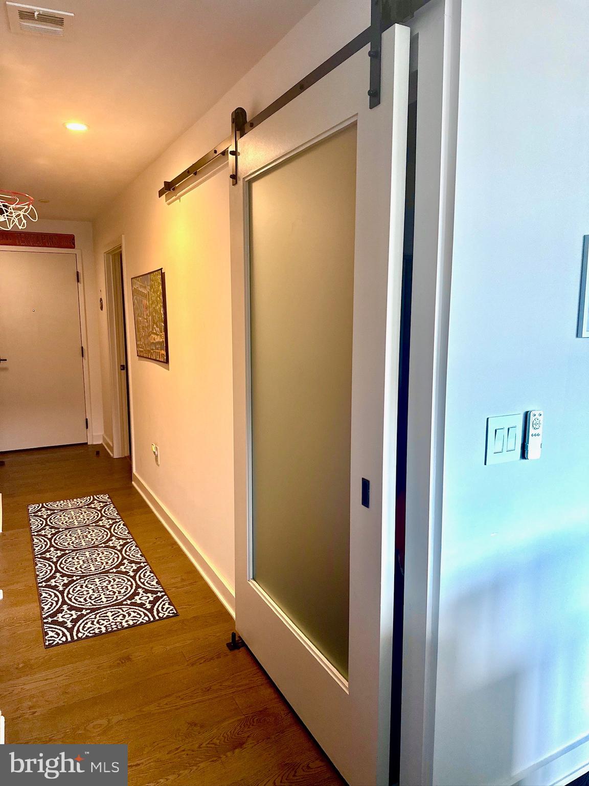 70 N Street Southeast, Unit 511 Washington, DC 20003 - Photo 5 of 22 a walk in closet with wooden floor