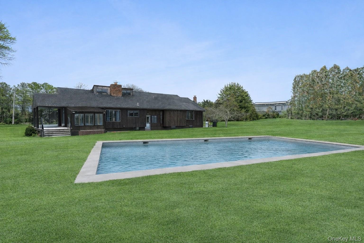 a view of outdoor space with garden and deck