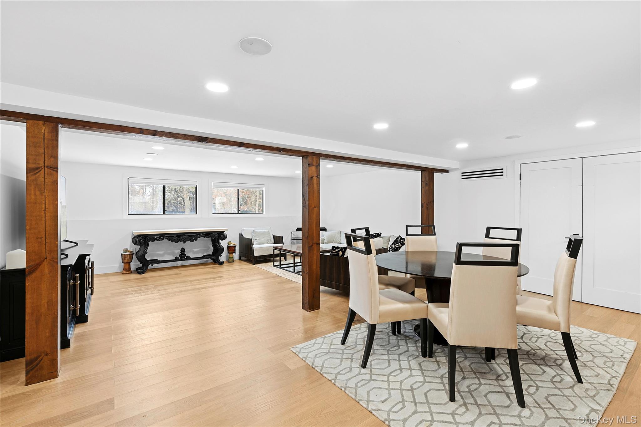 138 Longview Road Southampton, NY 11968 - Photo 11 of 13 a living room with furniture and a large window