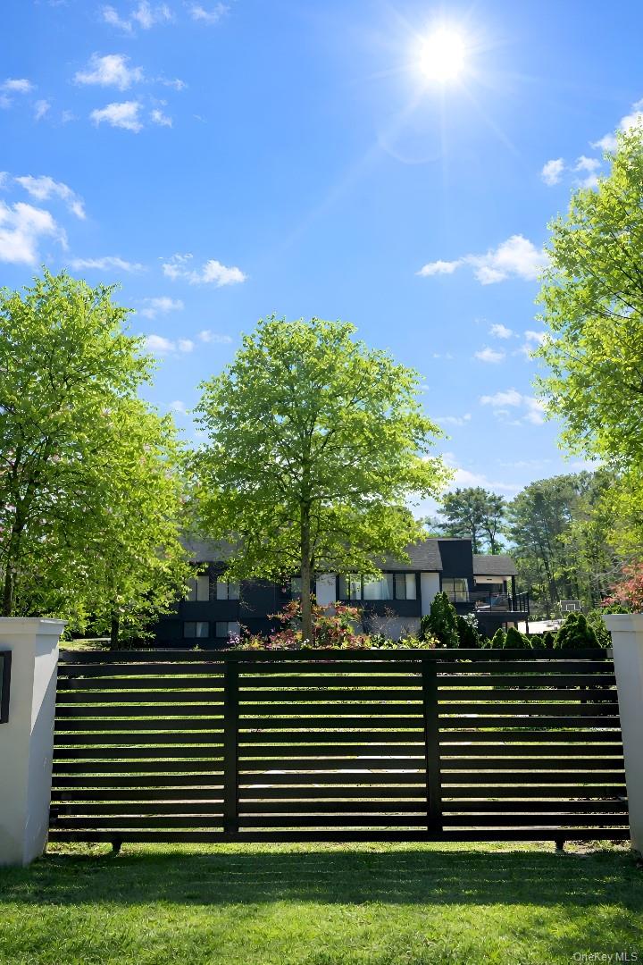 138 Longview Road Southampton, NY 11968 - Photo 12 of 13 a view of a porch with a yard