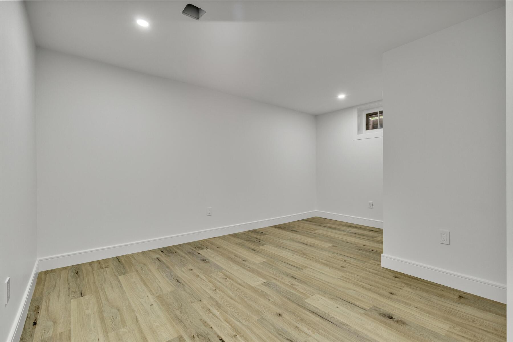 152 Pleasant Bay Road Harwich, MA 02645 - Photo 37 of 97 a view of empty room with wooden floor