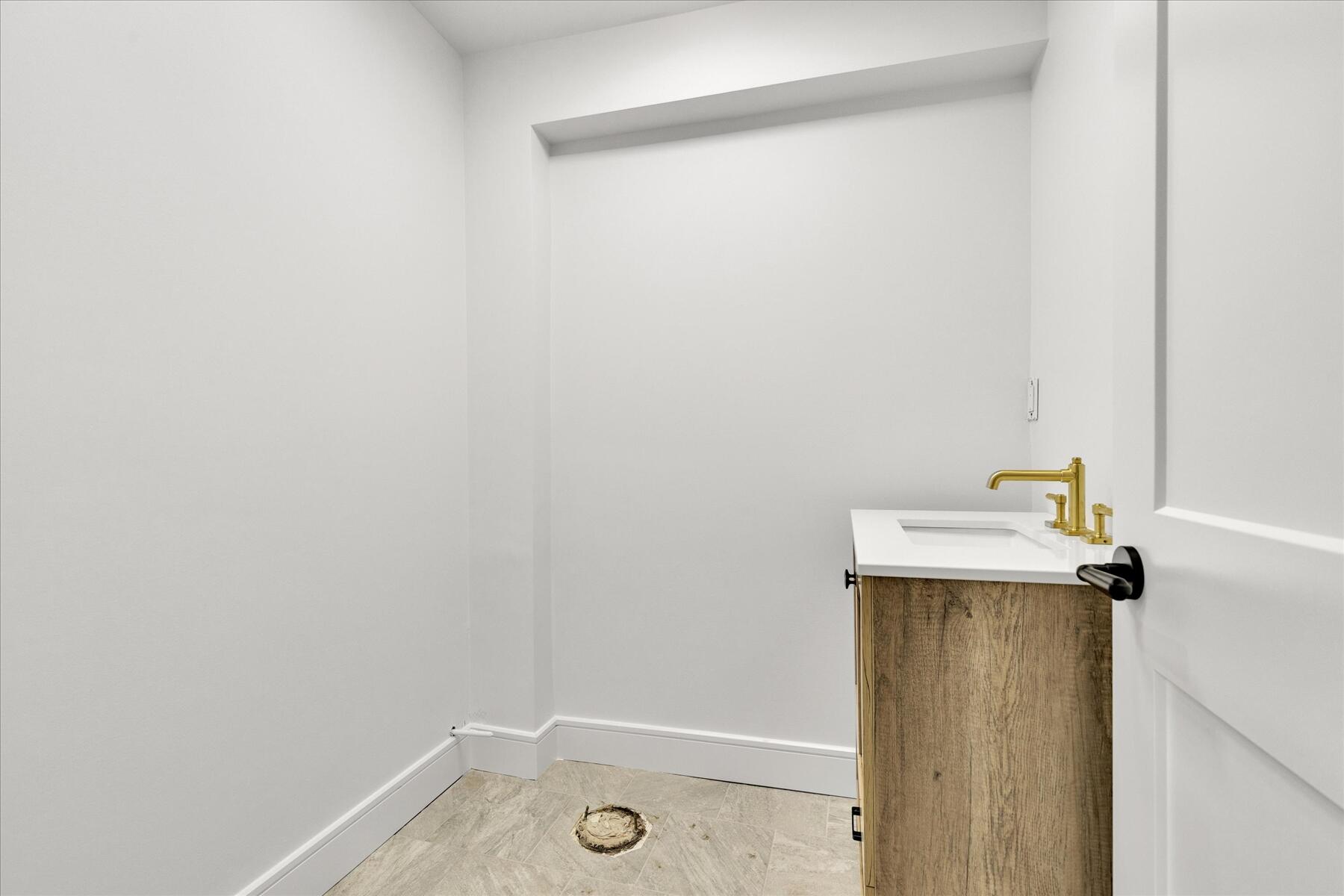 152 Pleasant Bay Road Harwich, MA 02645 - Photo 41 of 97 a bathroom with a sink and mirror