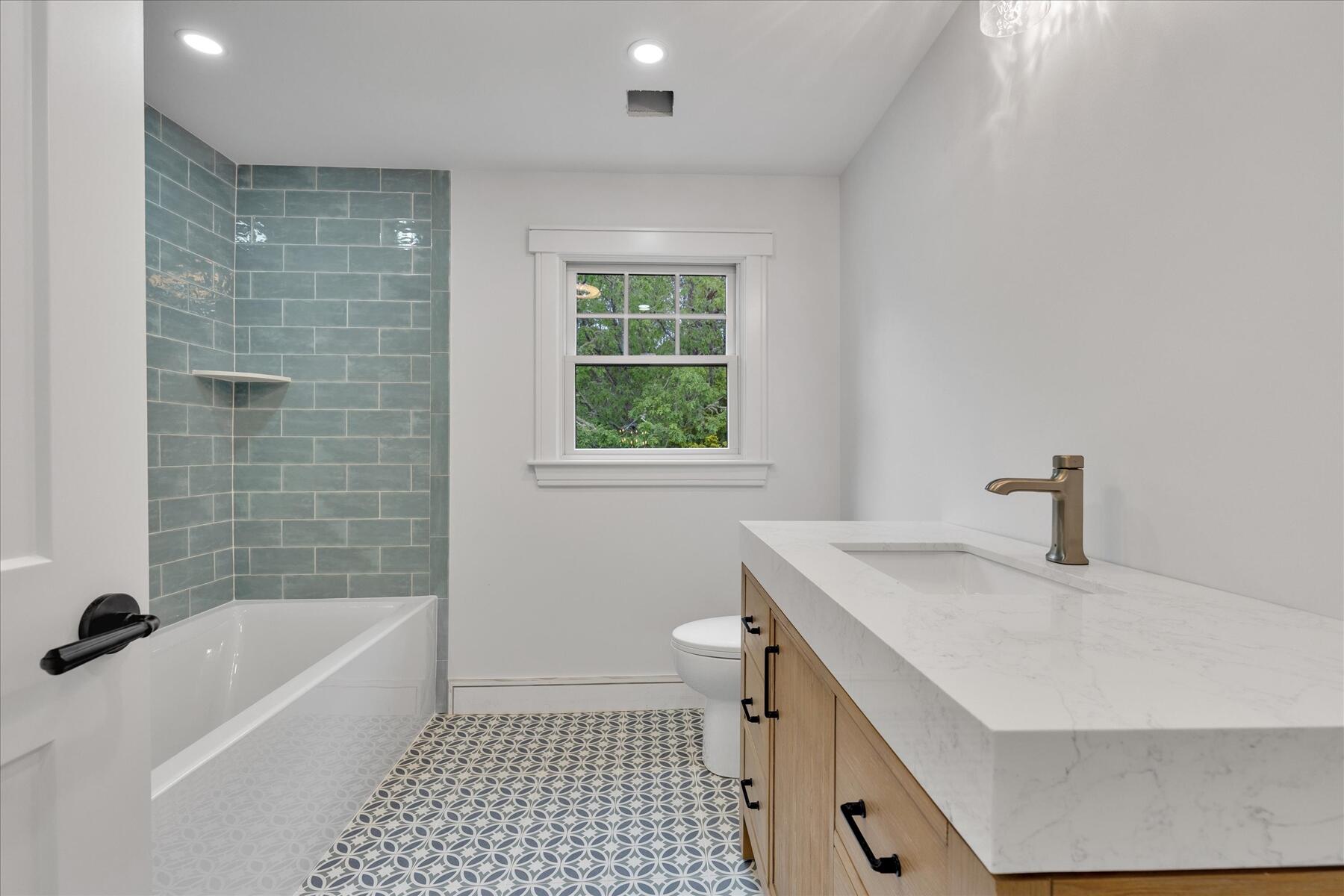 152 Pleasant Bay Road Harwich, MA 02645 - Photo 55 of 97 a bathroom with a sink a bathtub and a shower