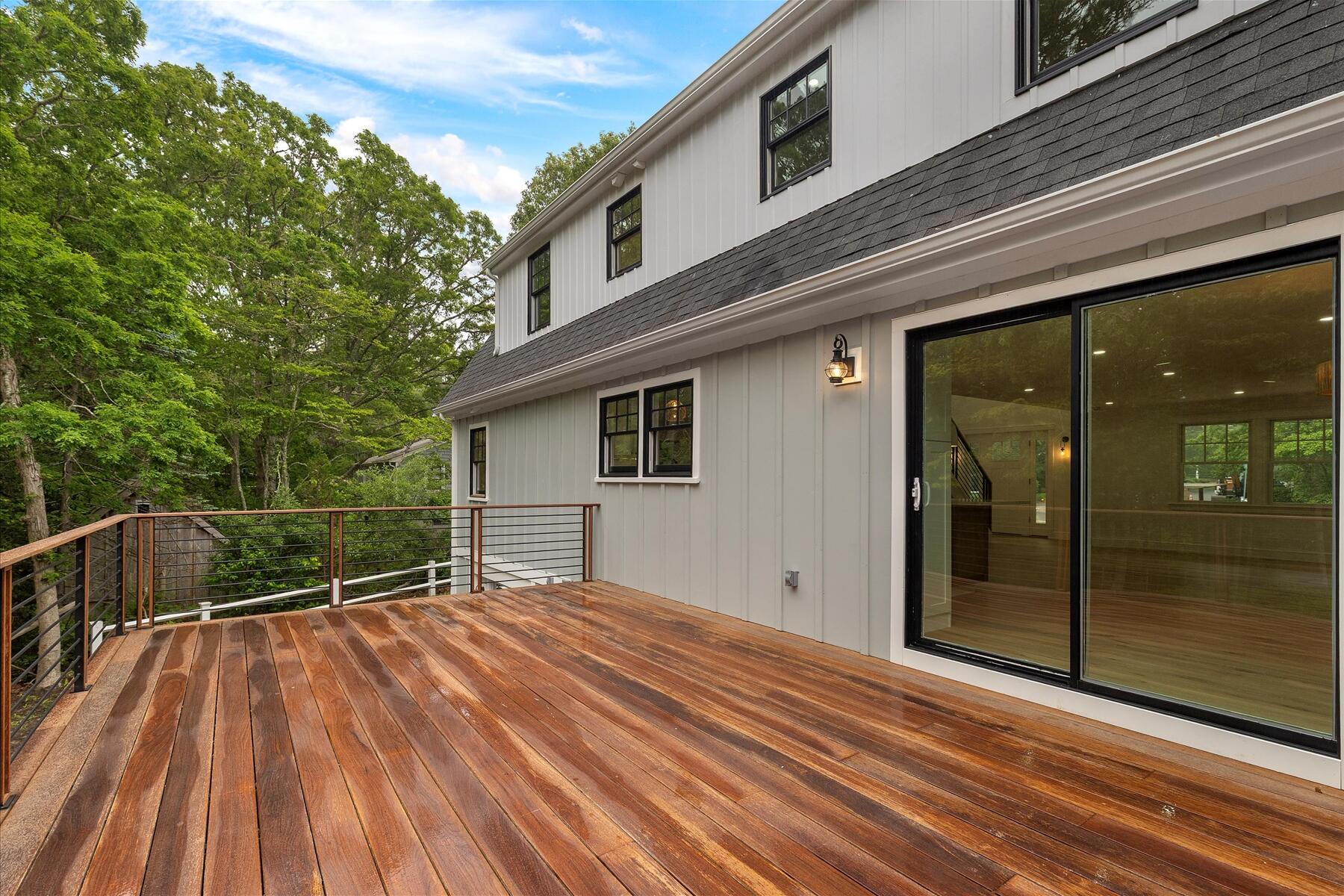 152 Pleasant Bay Road Harwich, MA 02645 - Photo 83 of 97 a view of a house with a roof deck
