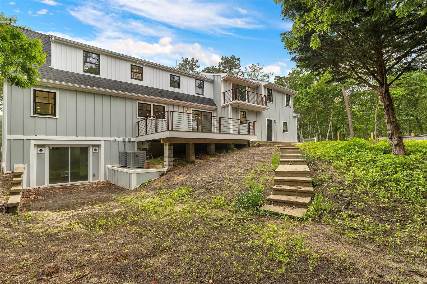152 Pleasant Bay Road Harwich, MA 02645 - Photo 86 of 97 a front view of a house with a yard