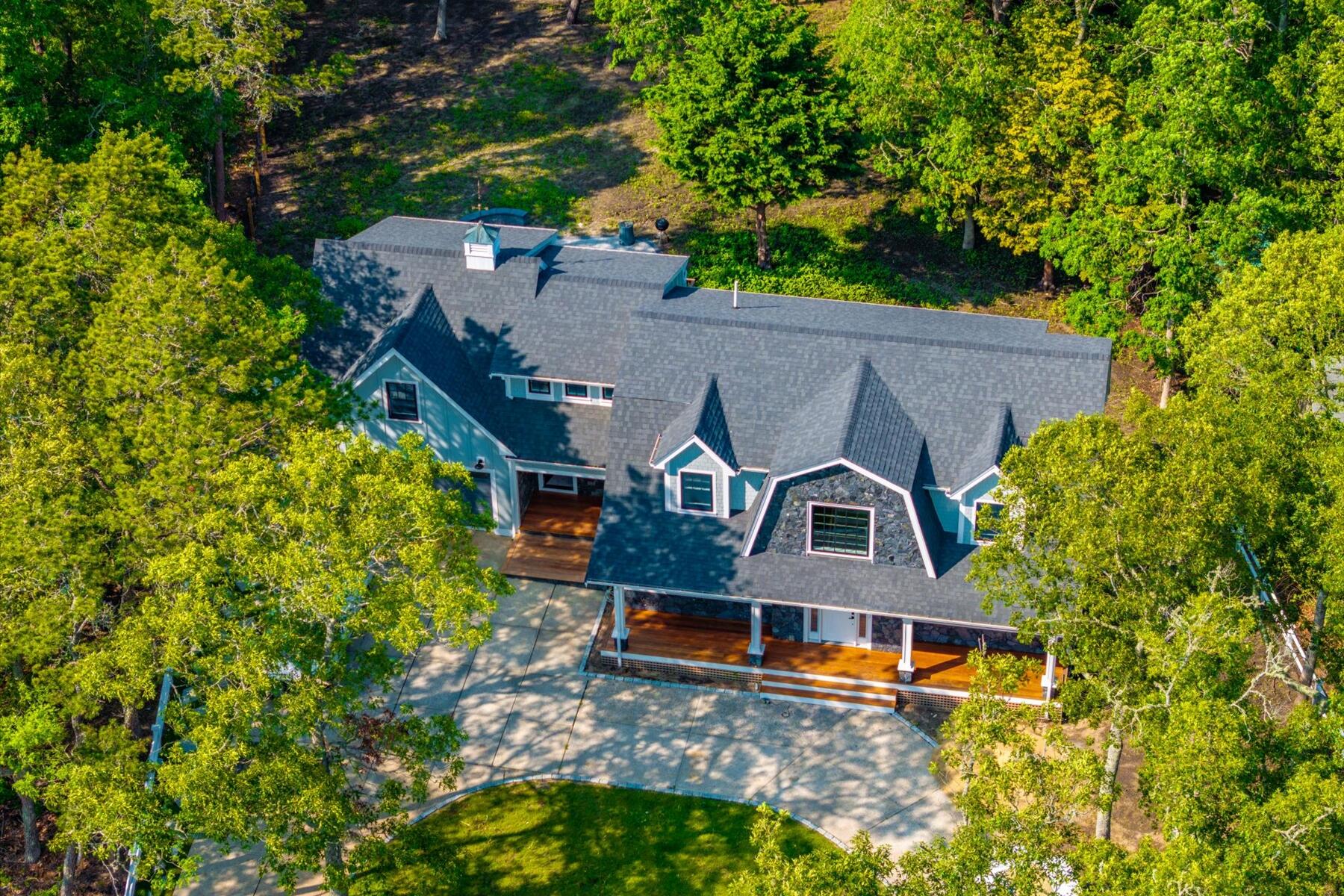 152 Pleasant Bay Road Harwich, MA 02645 - Photo 90 of 97 an aerial view of a house