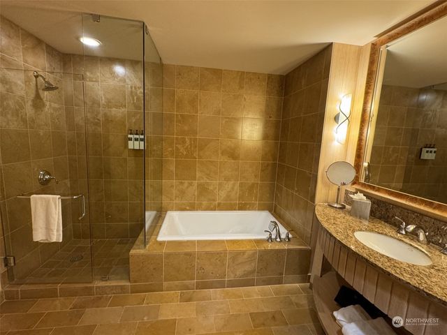 a view of a city with an ocean