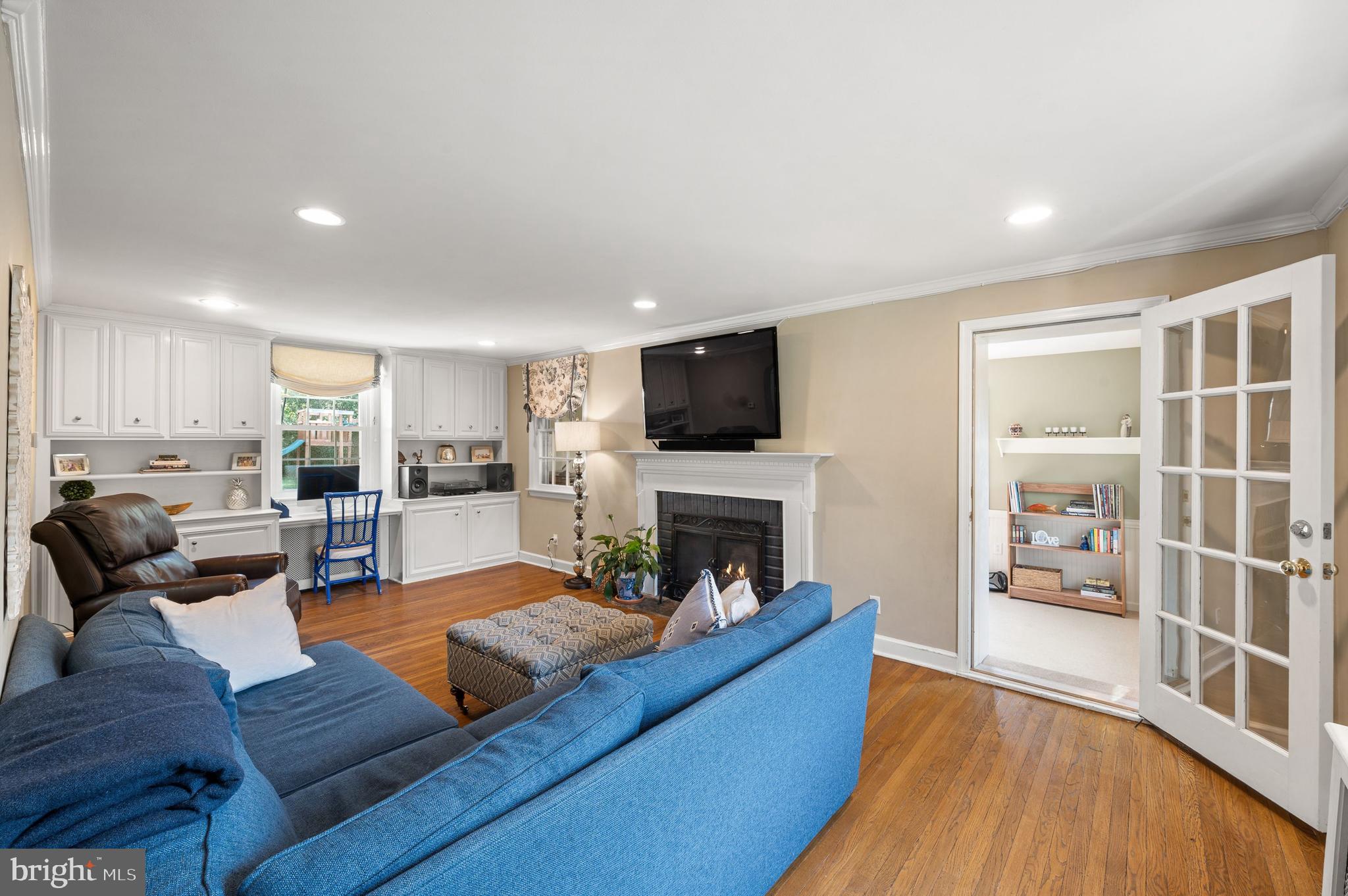 493 School Lane Wayne, PA 19087 - Photo 4 of 40 Recessed lights and wall of custom built-ins