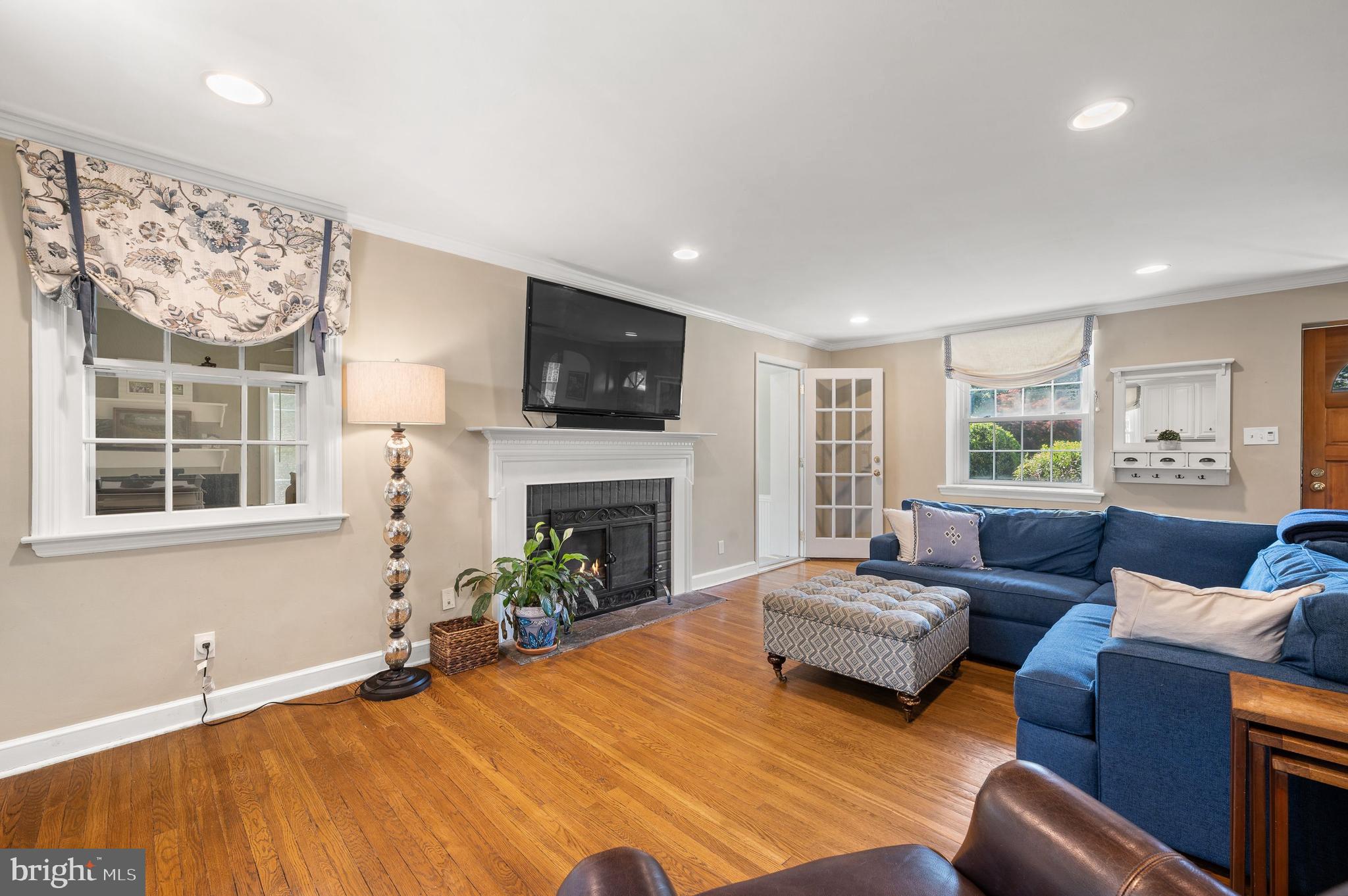 493 School Lane Wayne, PA 19087 - Photo 5 of 40 Cozy fireplace and access to bonus room