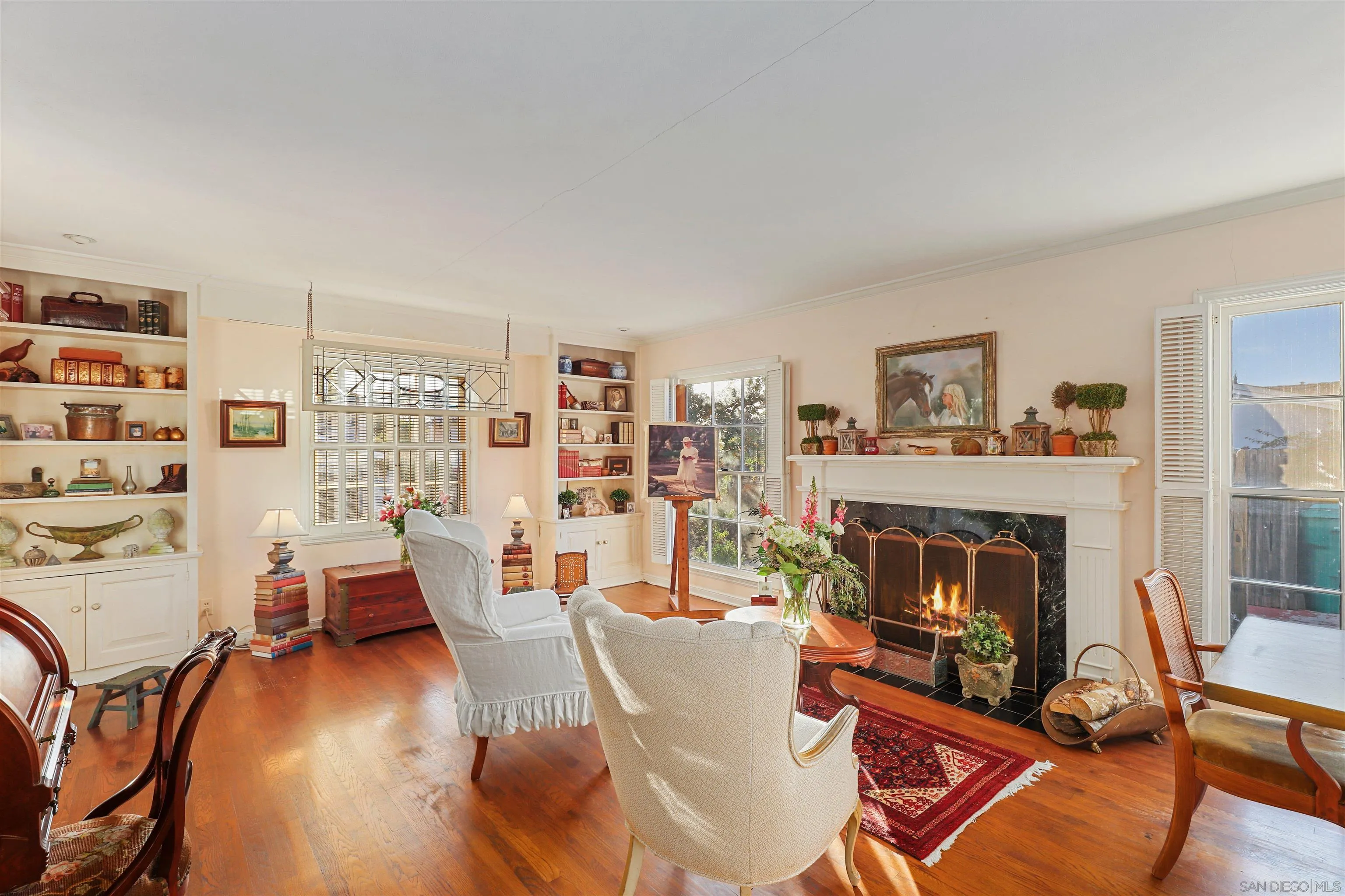 6029 Waverly Avenue La Jolla, CA 92037 - Photo 11 of 48 a living room with furniture and a fireplace