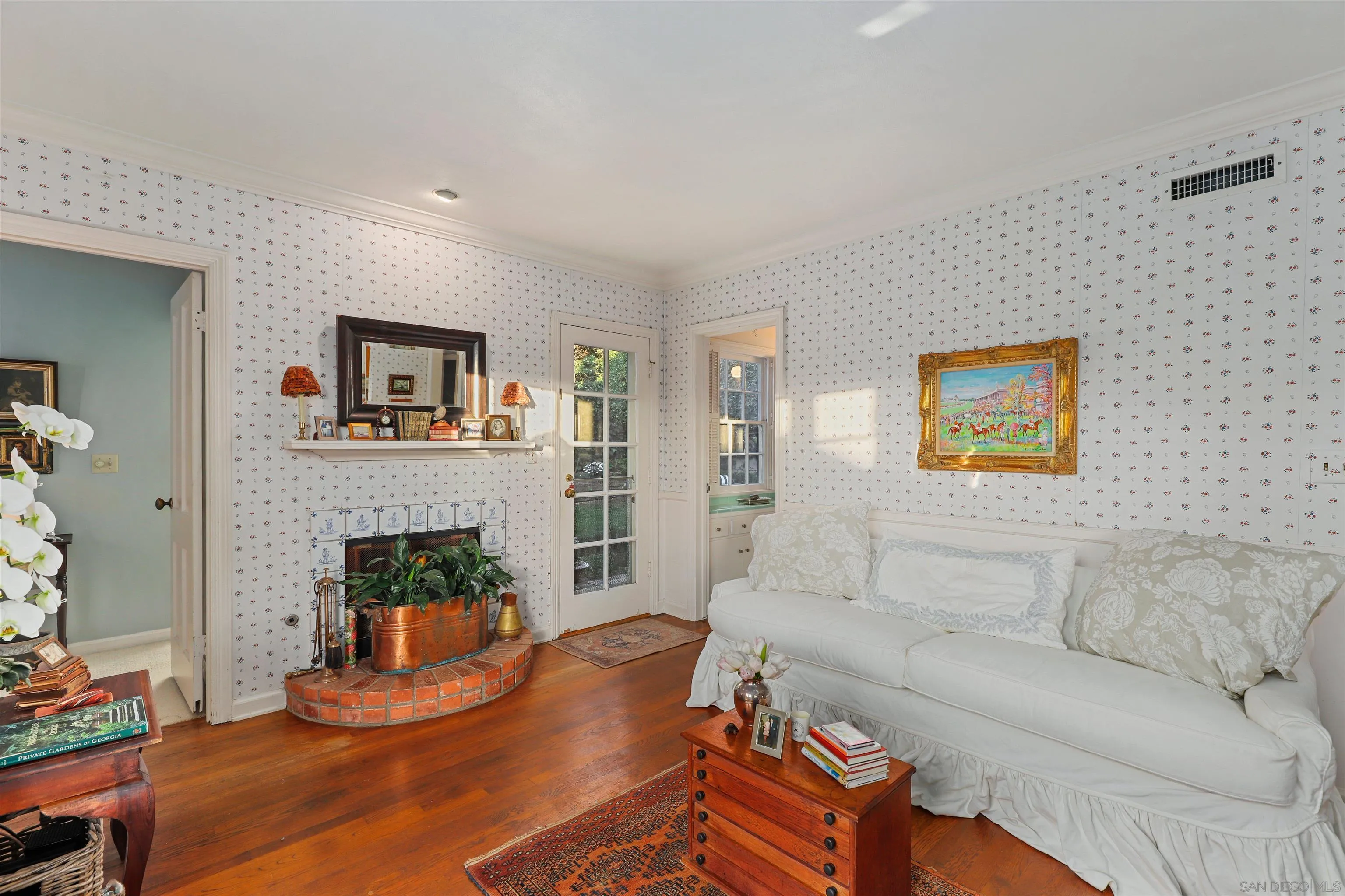 6029 Waverly Avenue La Jolla, CA 92037 - Photo 16 of 48 a living room with furniture and a fireplace