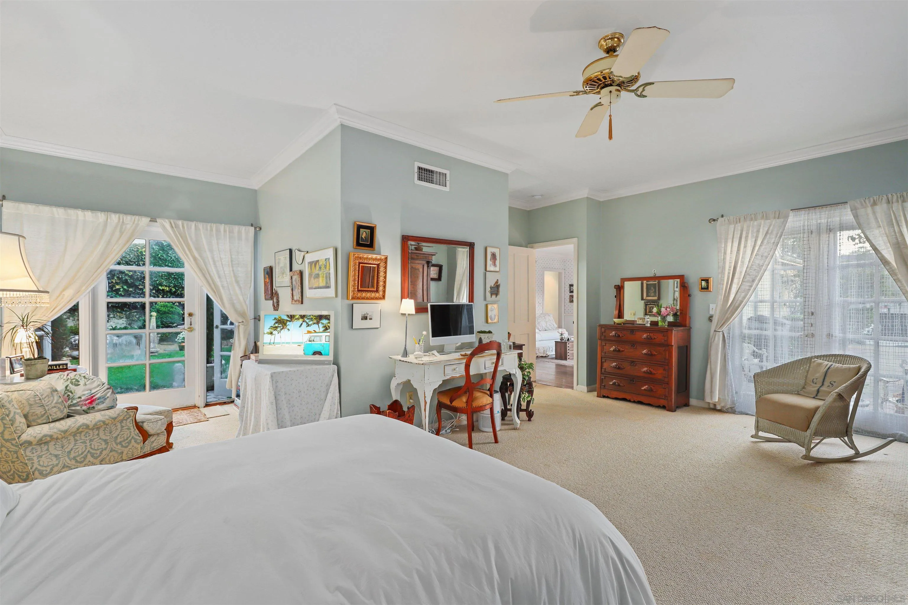 6029 Waverly Avenue La Jolla, CA 92037 - Photo 22 of 48 a bed room with a bed and a chair