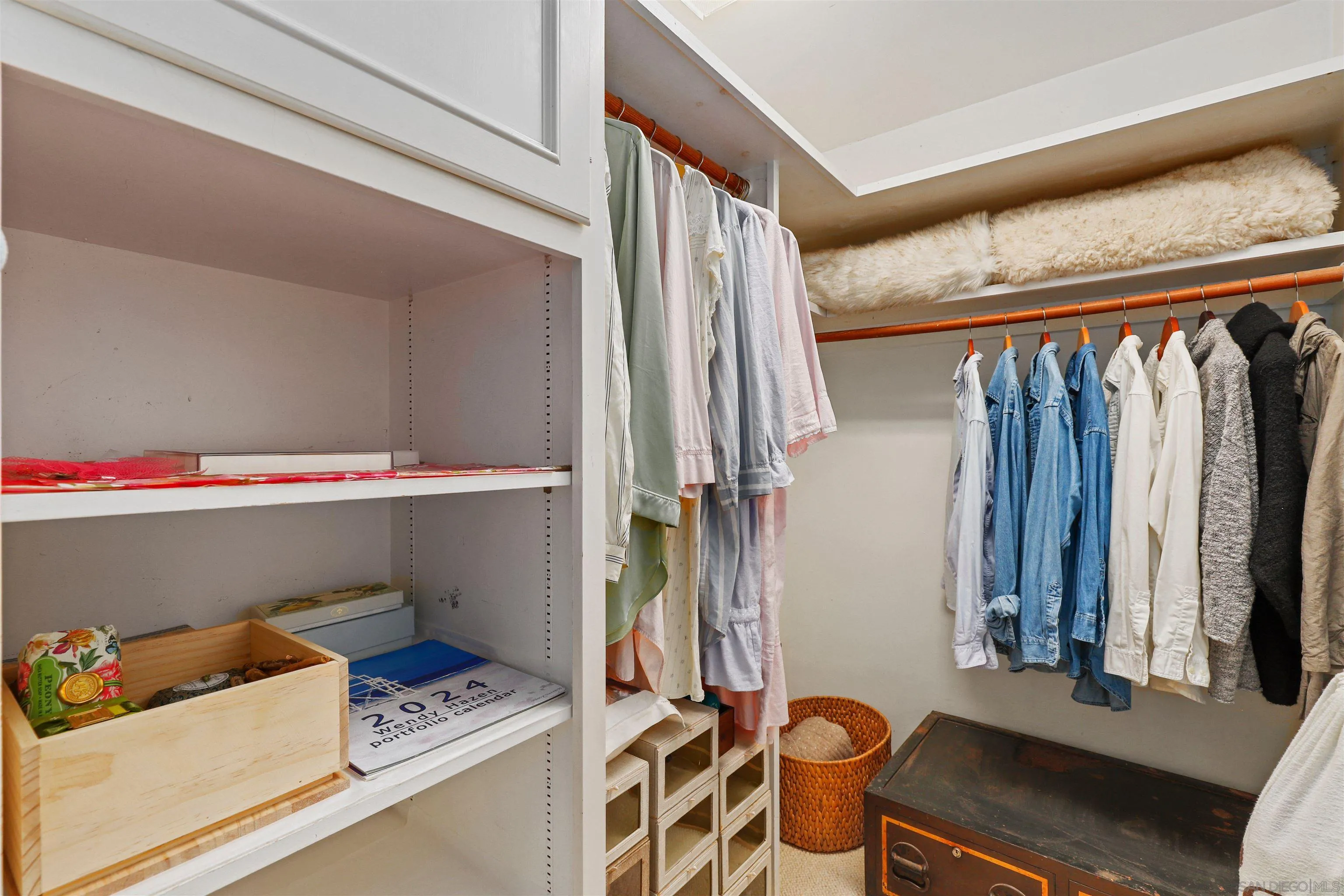6029 Waverly Avenue La Jolla, CA 92037 - Photo 28 of 48 a view of walk in closet with clothes and shoes