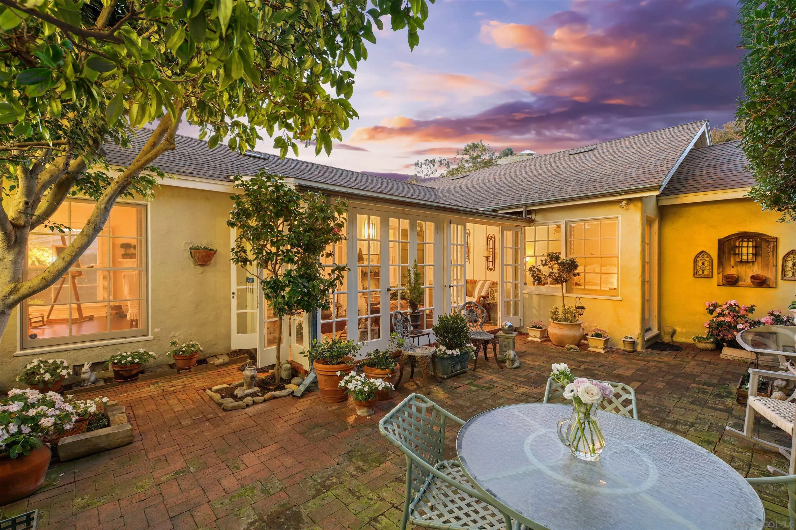 6029 Waverly Avenue La Jolla, CA 92037 - Photo 3 of 48 a view of a patio with swimming pool table and chairs