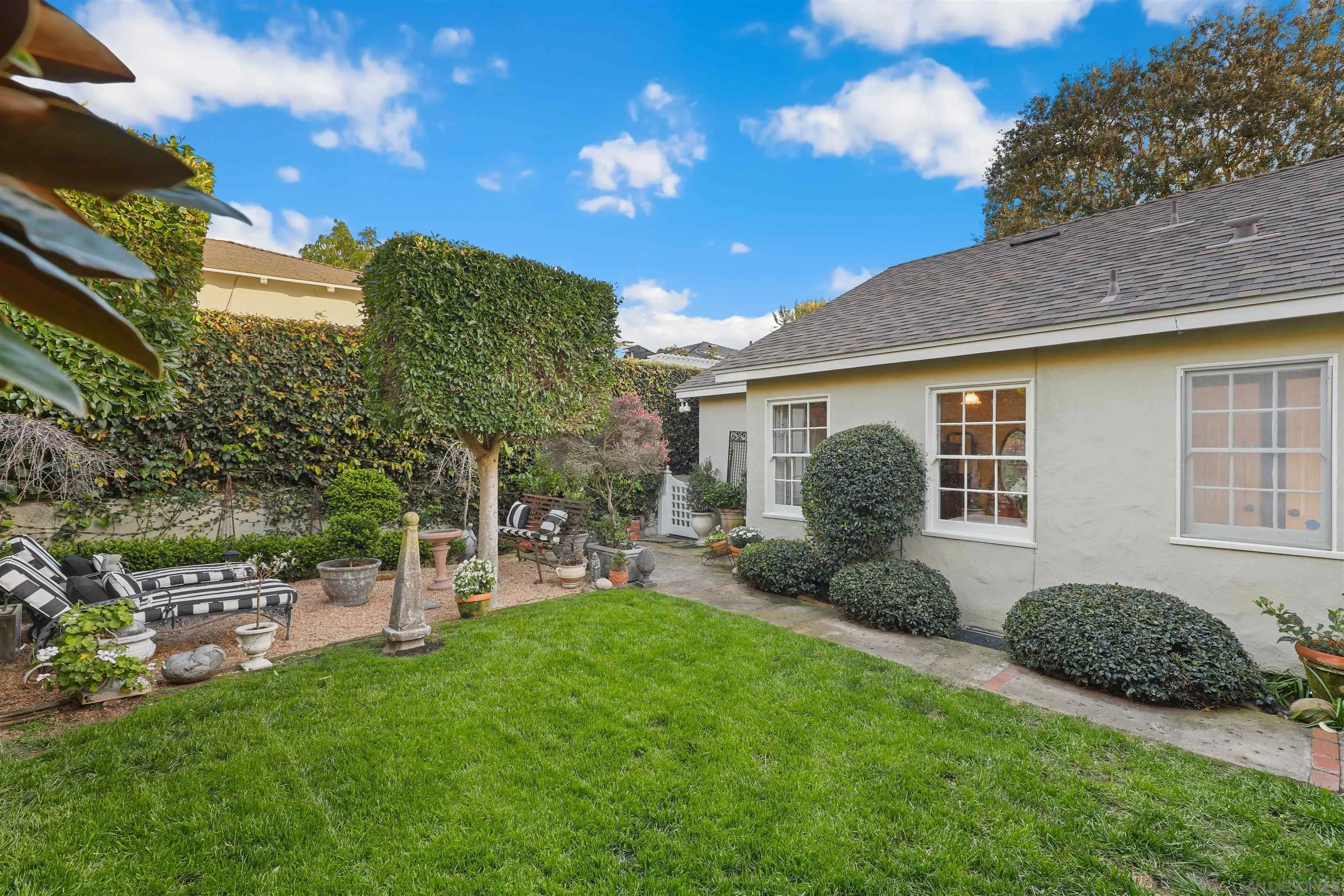 6029 Waverly Avenue La Jolla, CA 92037 - Photo 38 of 48 a view of a house with backyard and a tree