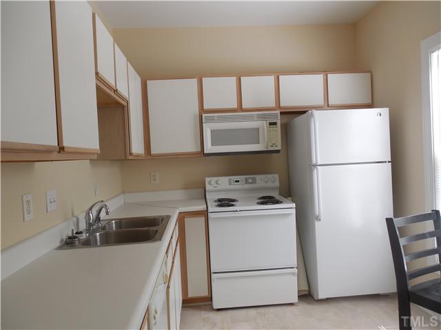 2604 Sterling Park Drive Raleigh, NC 27603 - Photo 4 of 10 a utility room with dryer and washer