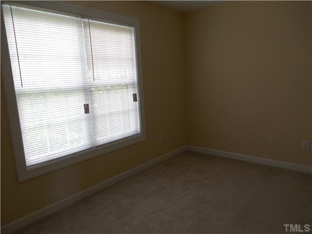 2604 Sterling Park Drive Raleigh, NC 27603 - Photo 7 of 10 a view of an empty room with a window