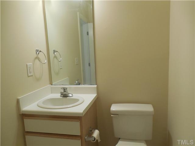 2604 Sterling Park Drive Raleigh, NC 27603 - Photo 9 of 10 a bathroom with a sink and a toilet