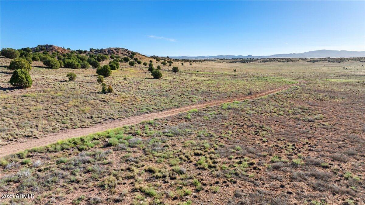 4055 West Covey Ridge Lane, Unit 23 Prescott, AZ 86305 - Photo 7 of 19 a view of ocean view with wooden floor and mountain view