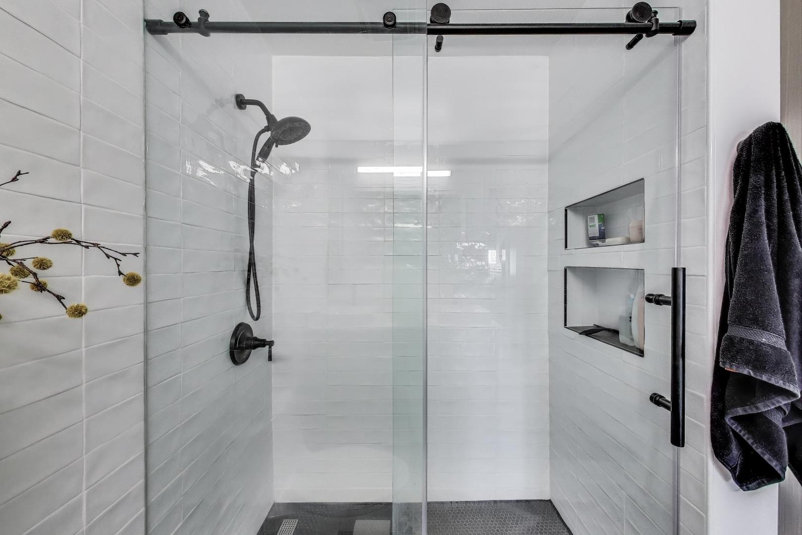 320 East 21st Street, Unit 501 Chicago, IL 60616 - Photo 11 of 22 a bathroom with a shower