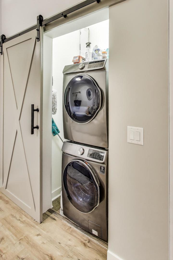 320 East 21st Street, Unit 501 Chicago, IL 60616 - Photo 14 of 22 a view of a storage & utility room with a washer dryer