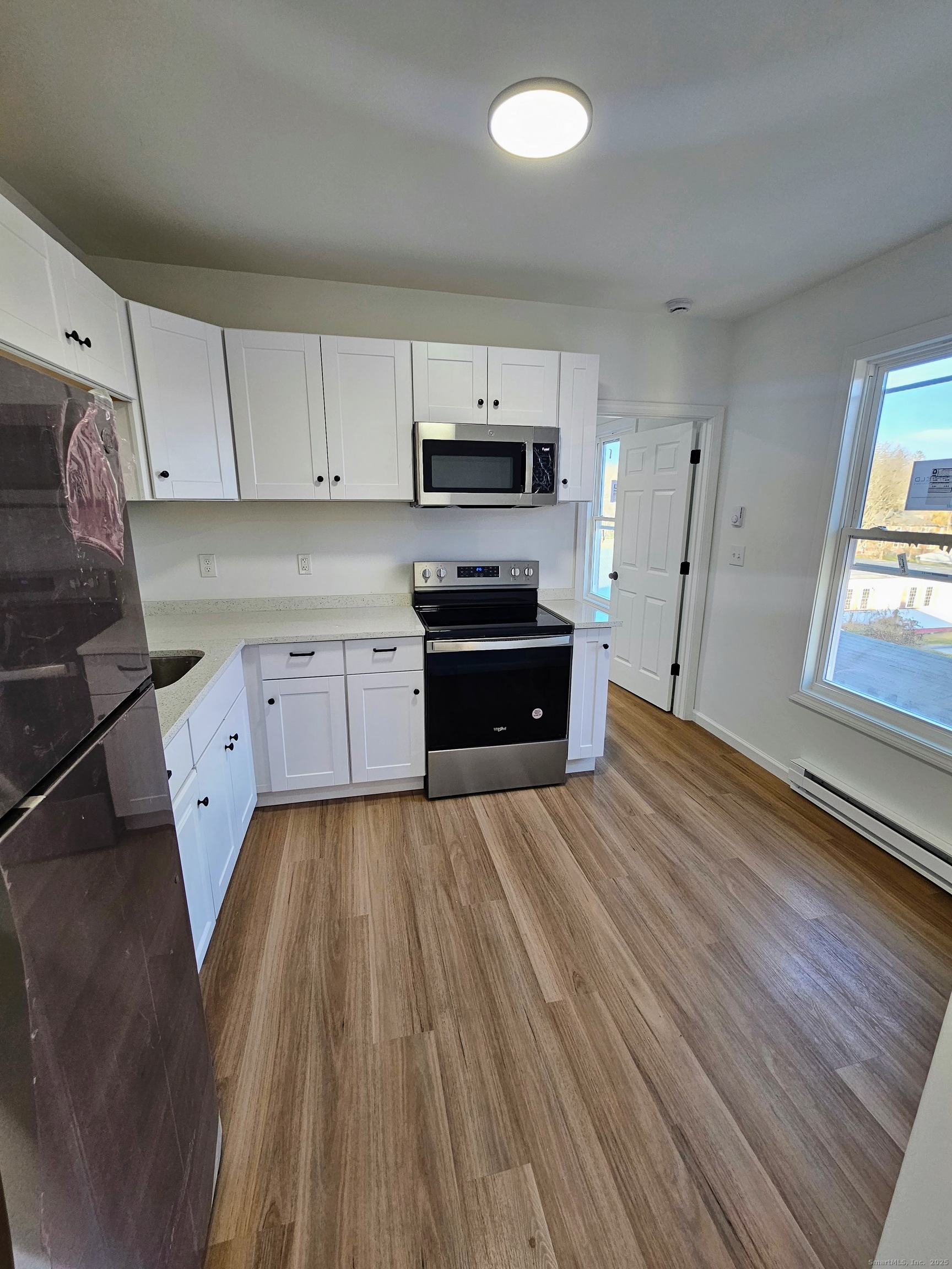 1153 Main Street, Unit 3A Windham, CT 06226 - Photo 2 of 13 All new appliances, cabinets, and countertops